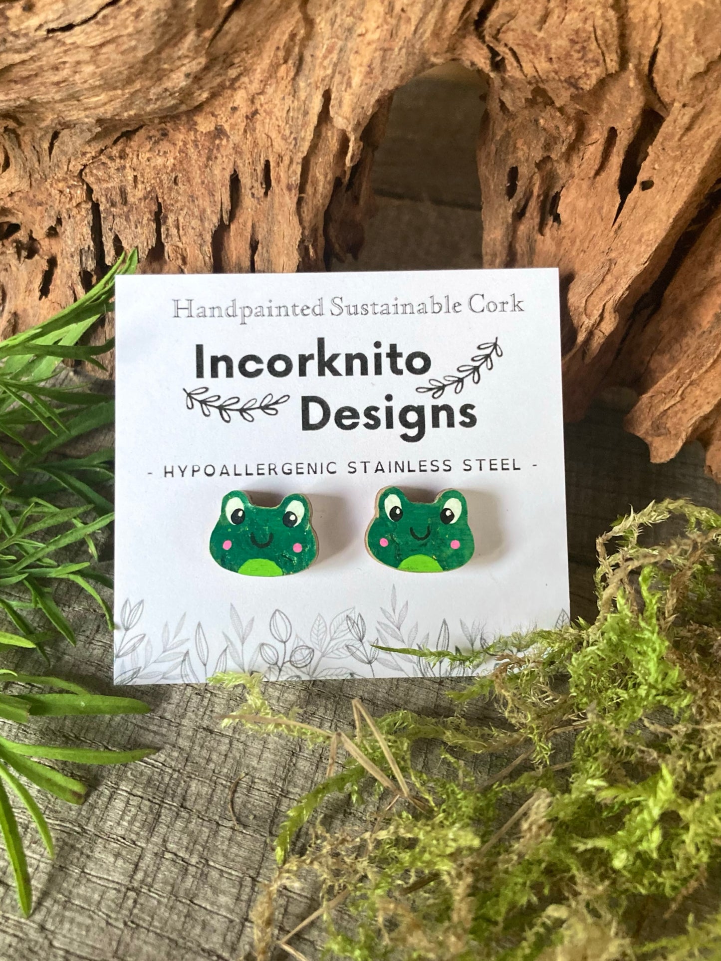 Cheerful frog cork stud earrings on an Incorknito Designs branded card