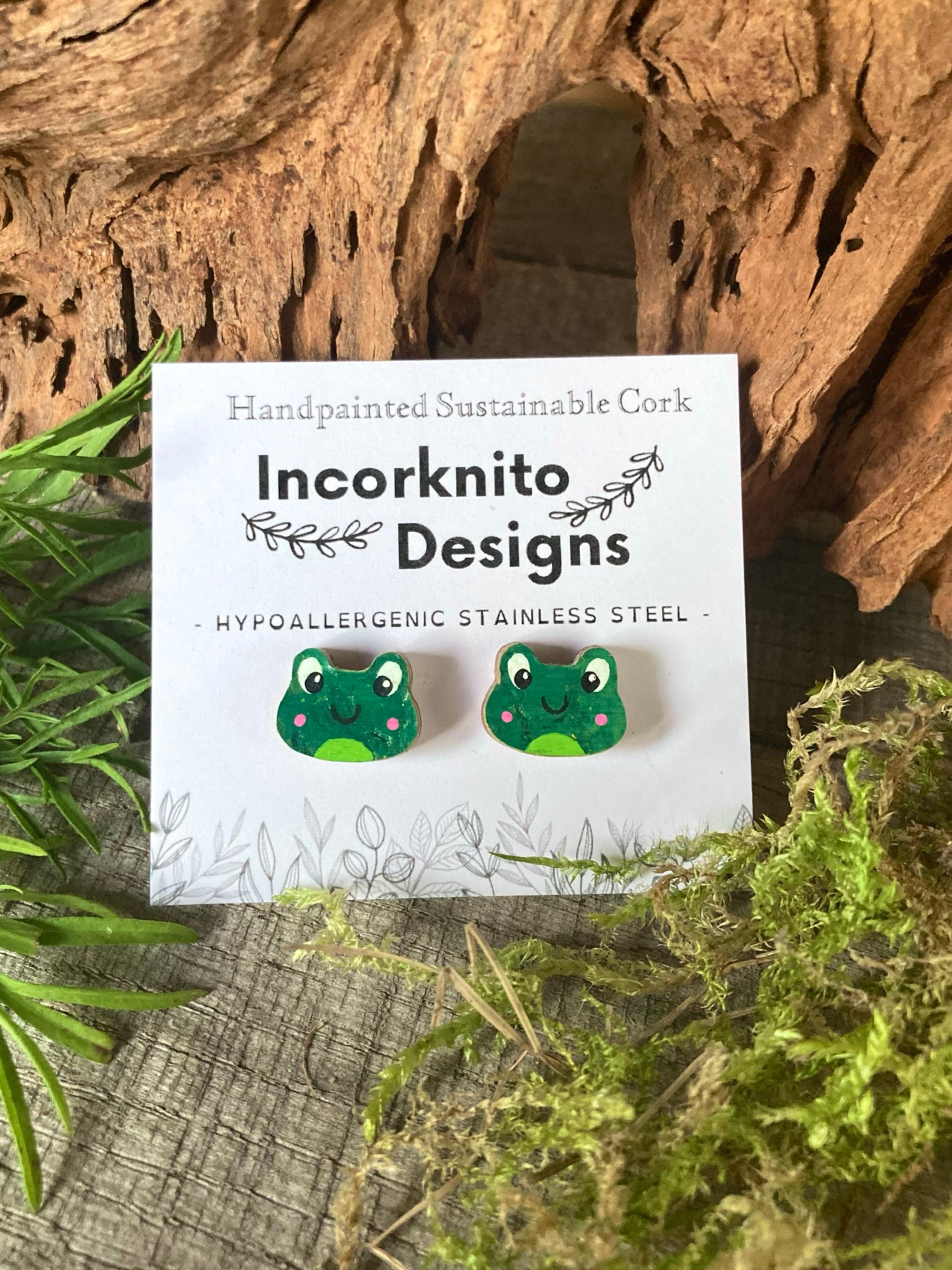 Cheerful frog cork stud earrings on an Incorknito Designs branded card