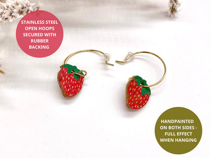 Infographic showing mini strawberry cork earrings are double-sided — handpainted on the front with natural cork texture on the reverse