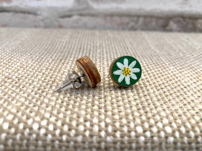Khaki daisy cork stud earring showing front painted face and FSC wood reverse with stainless steel butterfly post