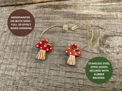 Infographic showing red toadstool cork mini hoop earrings handpainted on both sides — full painted reverse on stainless steel open back hoops