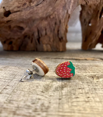 Strawberry cork stud earring showing front painted face and FSC wood reverse with stainless steel butterfly and silicone posts
