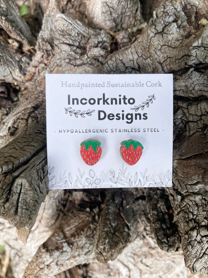 Strawberry cork stud earrings on an Incorknito Designs branded card with cork background
